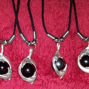 black dolphins necklaces